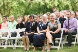 the guy in purple is thinking "ugh, i can't take pictures at this unplugged wedding? the worst!"
